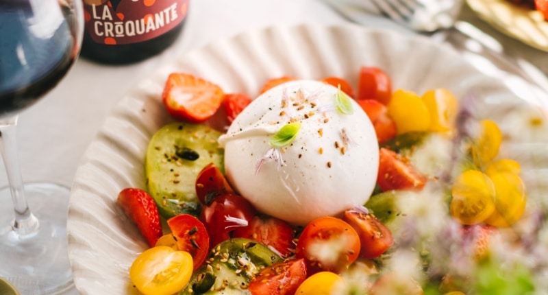 Burrata, tomatoes and strawberries salad & pistachios dukkah